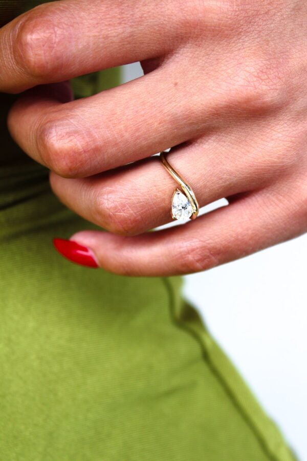 Floating Pear Solitaire Curved Band Engagement Ring Yellow Gold