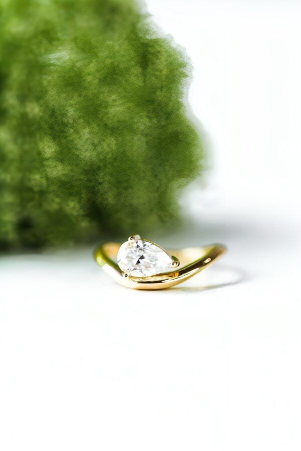 Floating Pear Solitaire Curved Band Engagement Ring South Africa 1