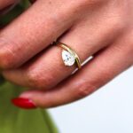 Floating Pear Solitaire Curved Band Engagement Ring