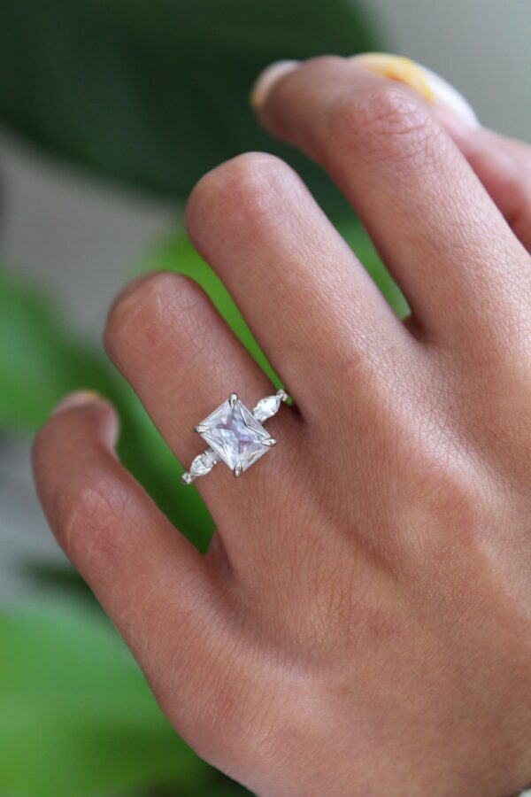 2ct Emerald Cut Moissanite Trilogy Ring - Image 2