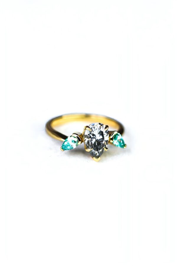 Levi - Grey And Blue Pear Moissanite Trilogy Engagement Ring - Image 5
