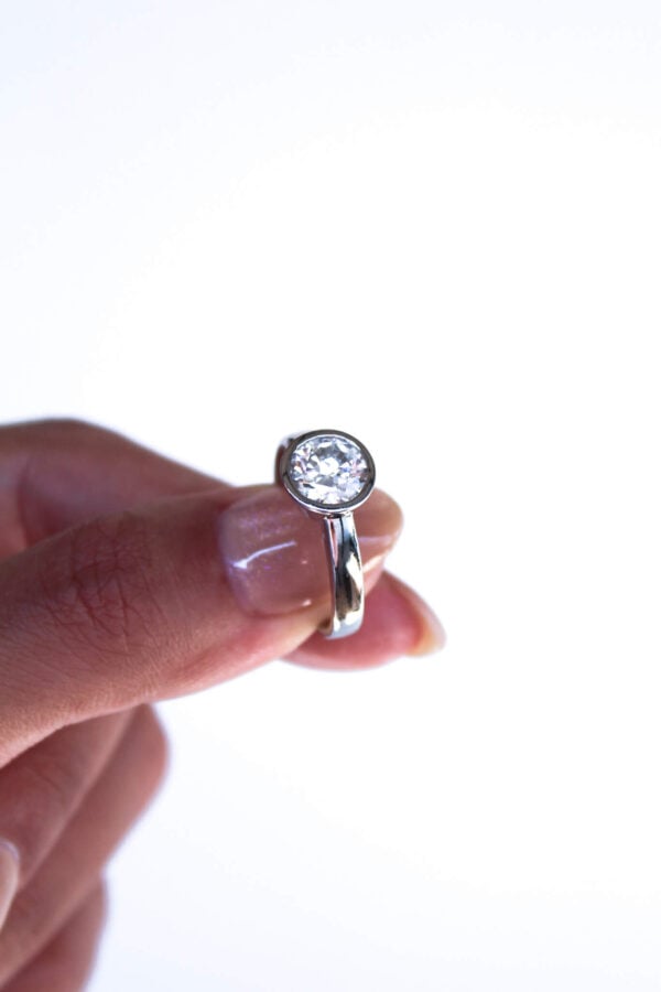 Platinum Bezel Moissanite Engagement Ring - Image 4