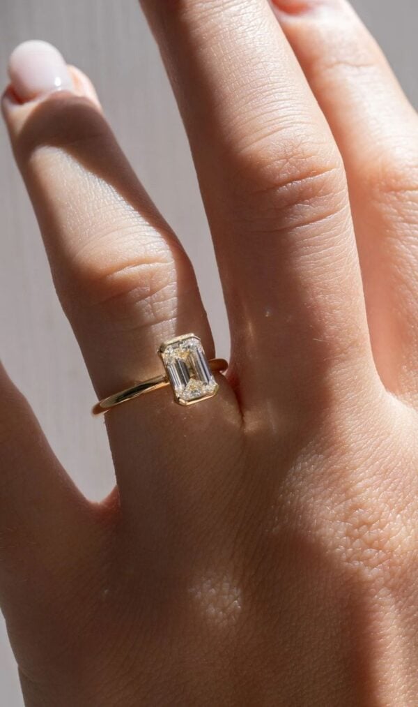 Emerald Cut Half Bezel Ring