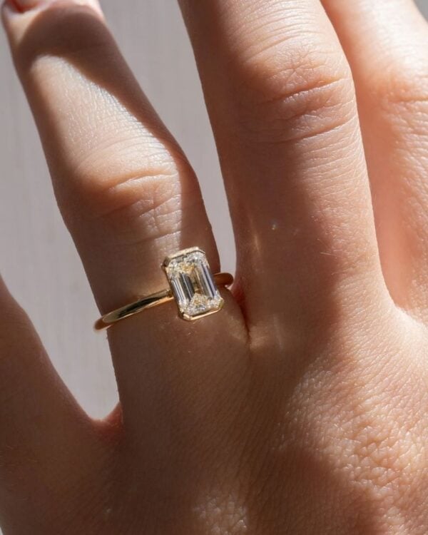 Emerald Cut Half Bezel Ring