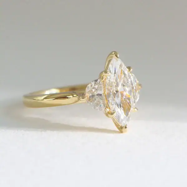 Marquise and Half Moon Trilogy Moissanite Engagement Rings