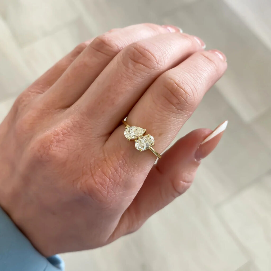 Oval and Pear Moissanite Toi Et Moi Ring
