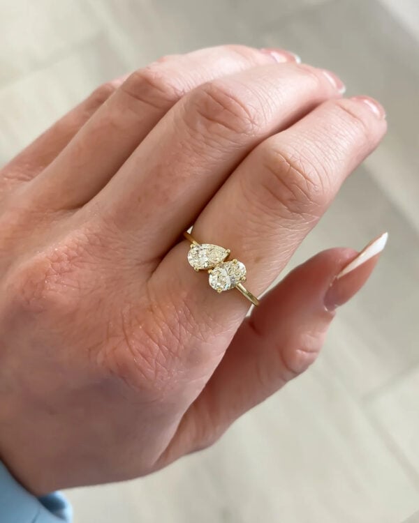Oval and Pear Moissanite Toi Et Moi Ring