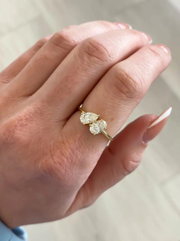 Oval and Pear Moissanite Toi Et Moi Ring