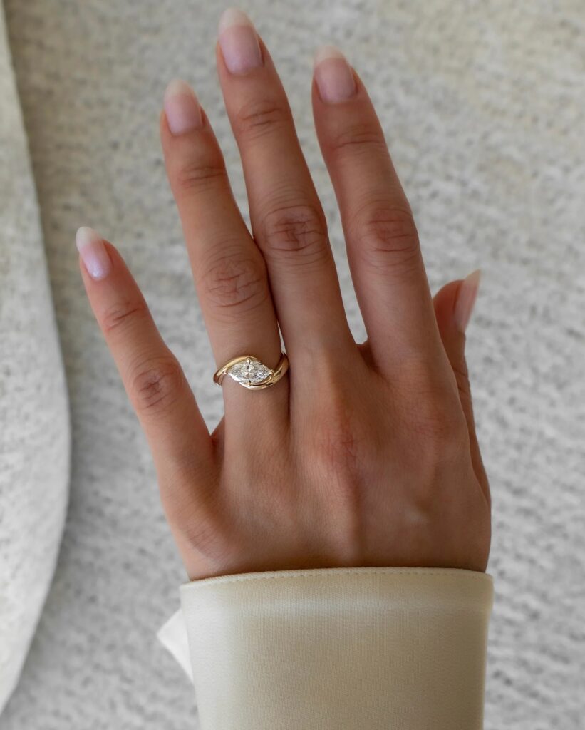 Swirled Marquise Moissanite Solitaire Engagement Ring - Celia