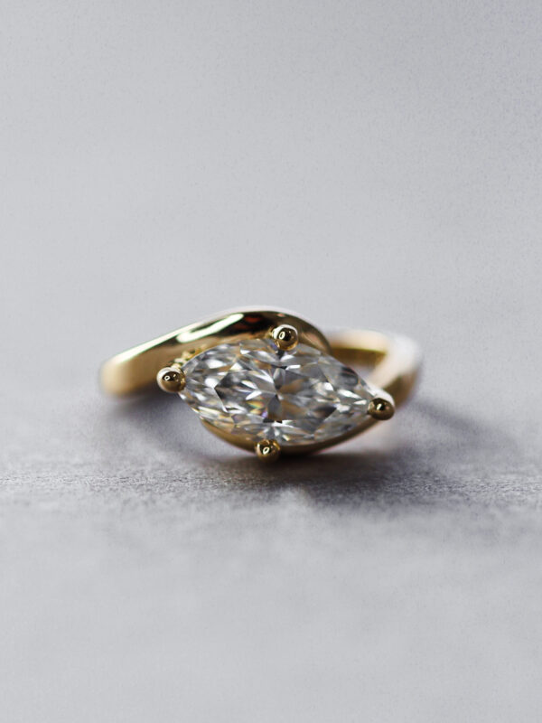 Swirled Marquise Moissanite Solitaire Engagement Ring