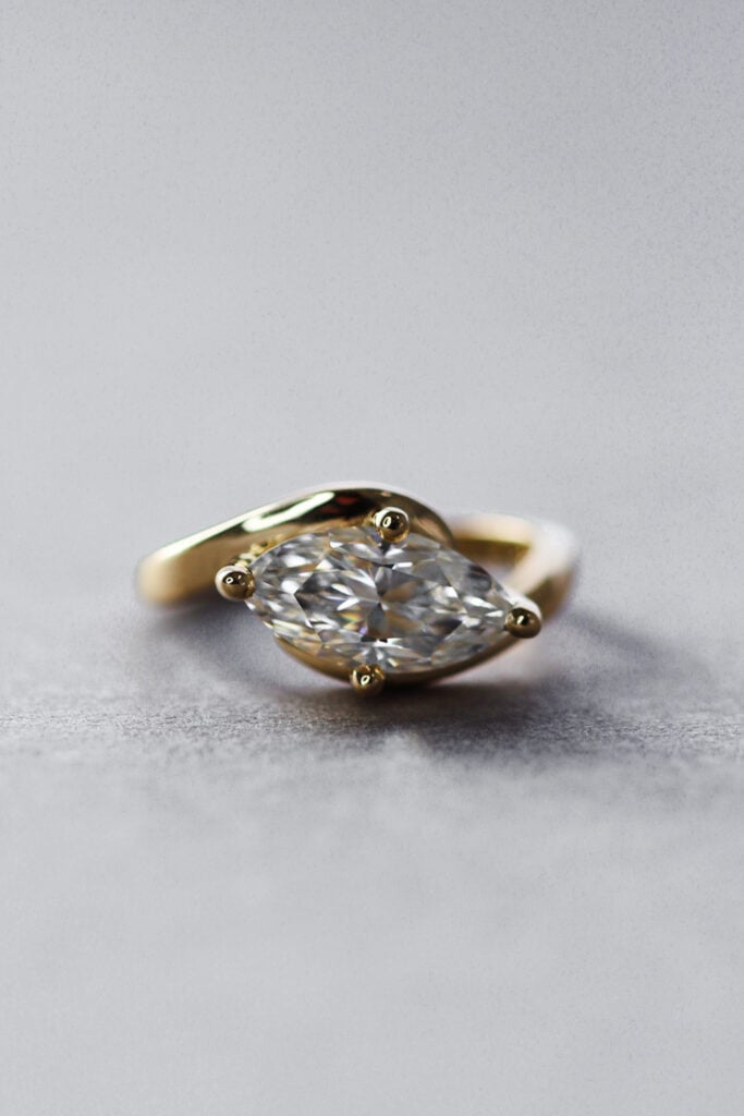 Swirled Marquise Moissanite Solitaire Engagement Ring - Celia