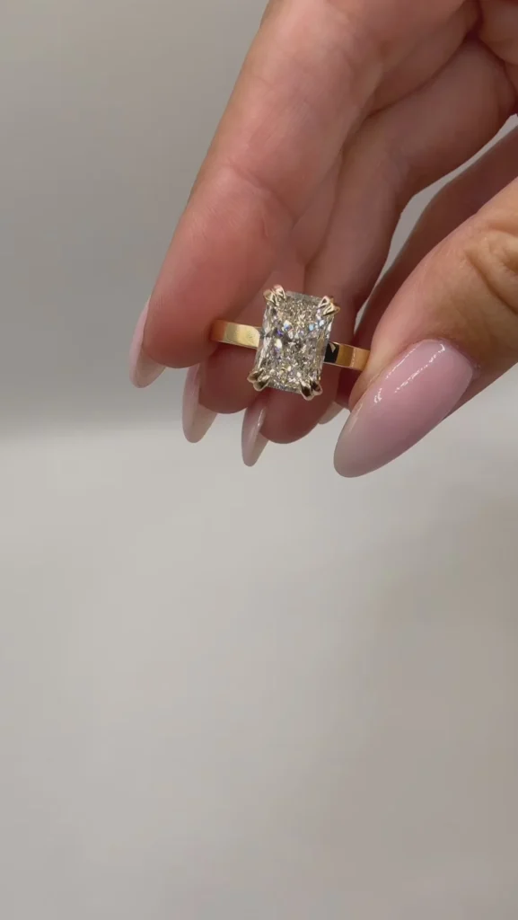 3ct Emerald Cut Double Claw Engagement Ring in 9ct Gold