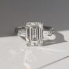 Emerald and Tapered Baguettes Engagement Ring