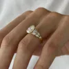 3ct-oval-and-marquise-cluster-engagement-ring-south-africa-moissanite-by-design-moissanite-engagement-rings-south-africa 2